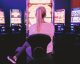 Casino gaming slot machine with progressive jackpot display showing large dollar amount